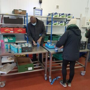 Some of our new volunteers hard at work in the depot | Shrewsbury Food Hub