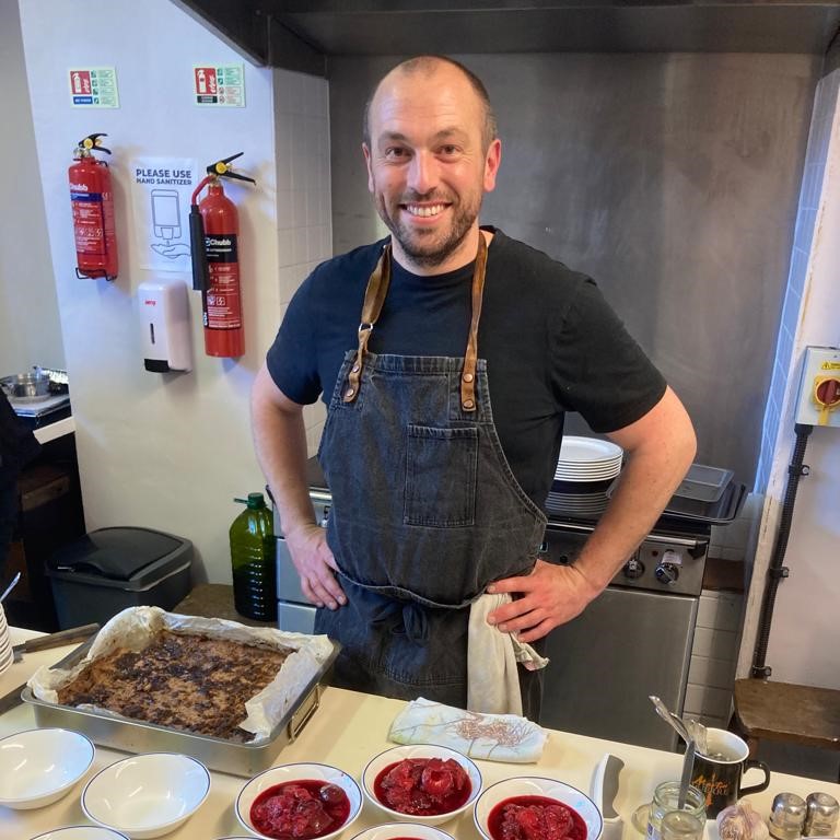 Steve Guy using surplus food to make delicious lunch